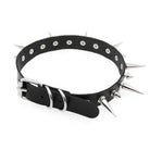 Black leather choker with silver spikes on a white background