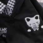 Black jacket with a cat patch and 'Black Linden' branding.