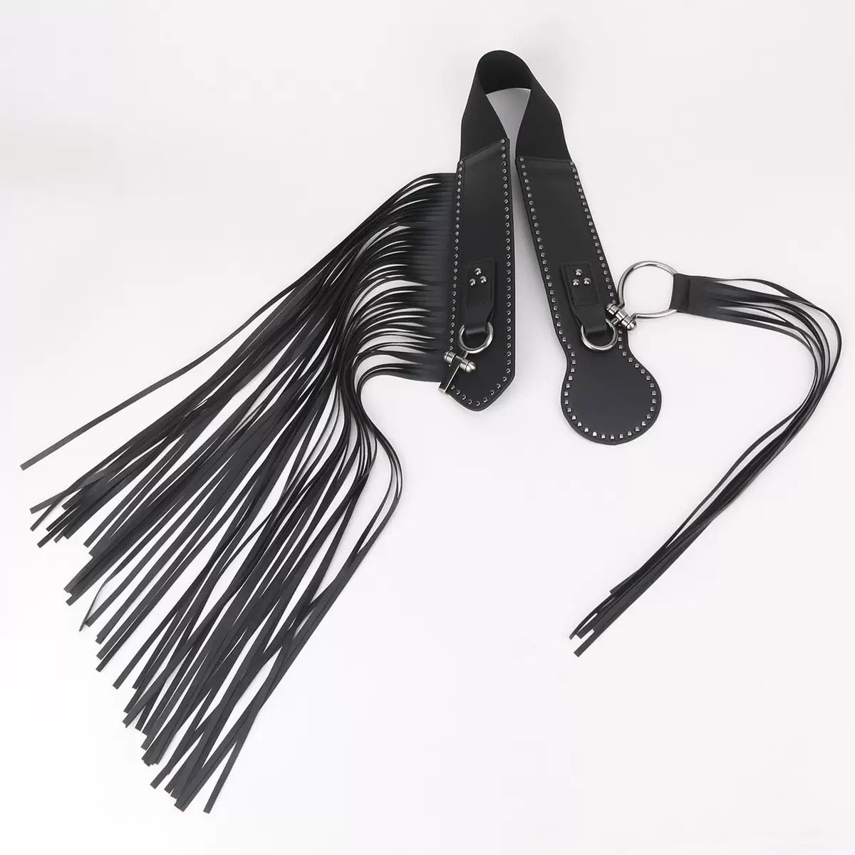 Black leather strap with tassel on a white background