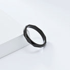 Black minimalist rhombus stainless steel ring band on a white background