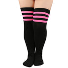 Black over-the-knee socks with three horizontal pink stripes near the top, shown on a model's legs against a plain white background.
