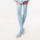 Light blue thigh-high socks with a white background
