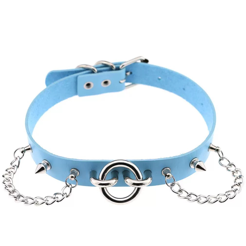 Blue leather choker with silver chain and spikes on a white background
