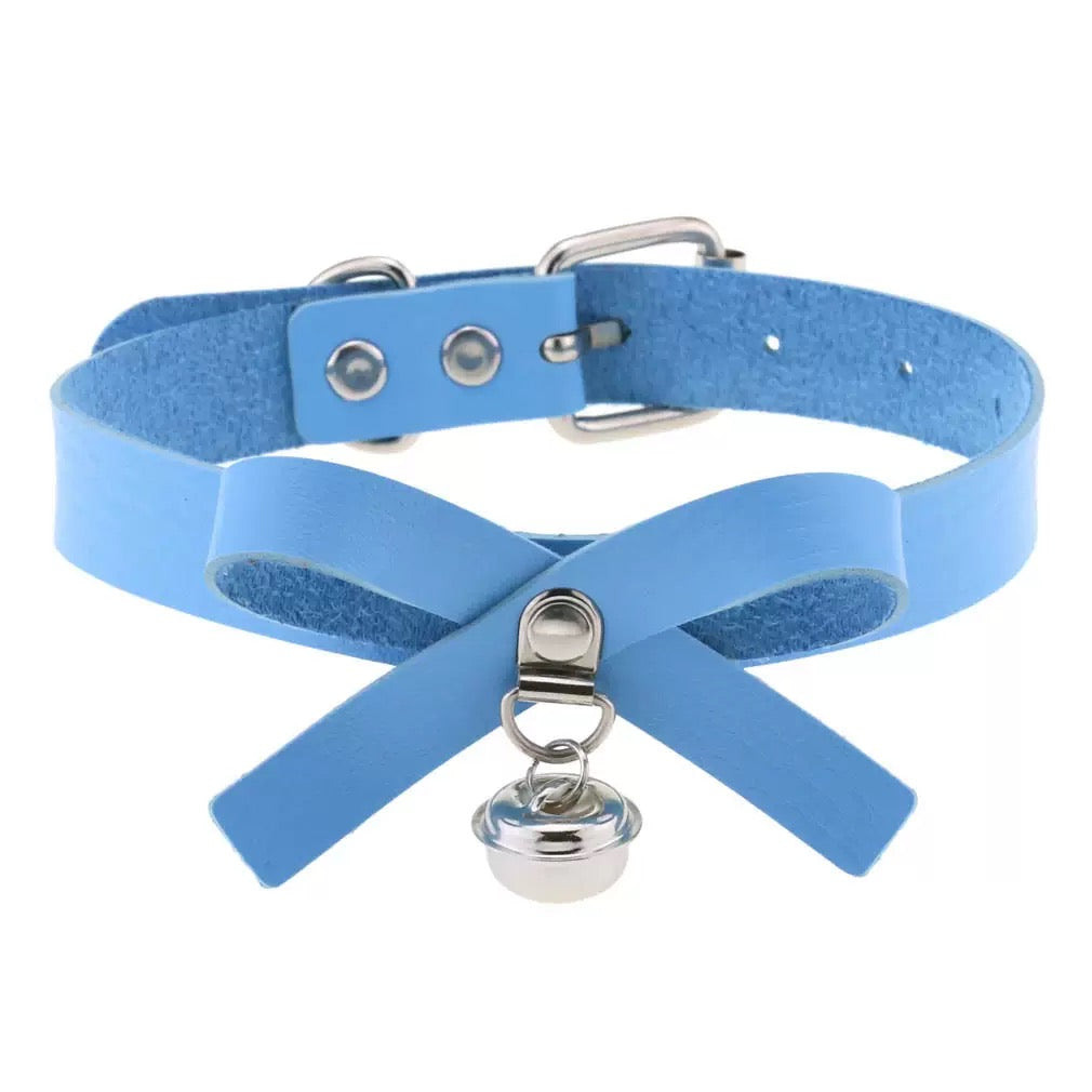 Blue leather choker with silver hardware and a bell on a white background