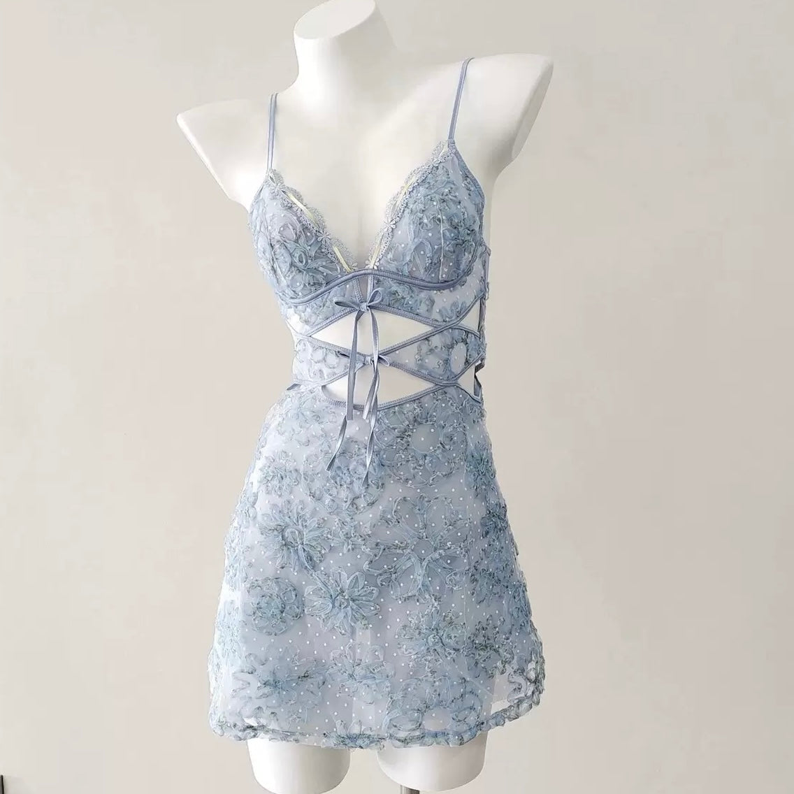Light blue sweet lace camisole nightgown on a mannequin against a white background