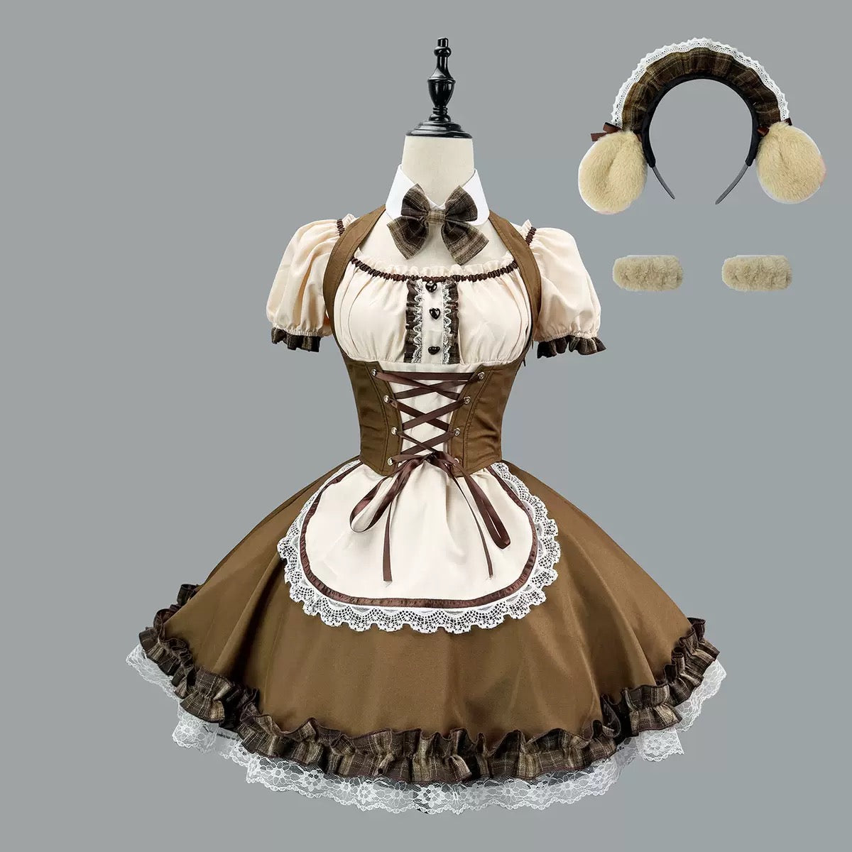 Brown and white dress with lace details on a mannequin, accompanied by a headband and fur accents.