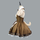 Brown dress with white lace trim on a mannequin against a gray background