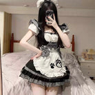 Person wearing a cat femboy cosplay maid dress