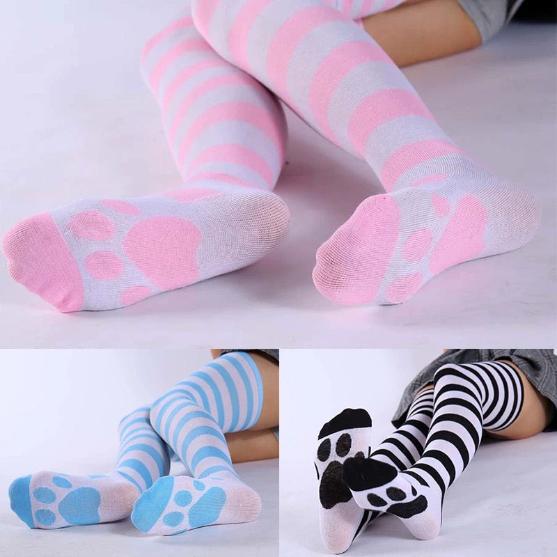 Collage of different styles of striped and patterned socks on a white background.