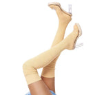Yellow thigh-high socks with high-heeled shoes on a white background
