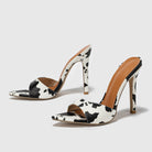 Cow print high heels