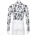 Cow print long sleeve crop top back