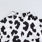 Cow print long sleeve crop top neck detail