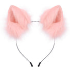 Light pink faux fur cat ears headband on a solid white background.