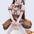 Femboy wearing a brown and beige maid outfit with a white background