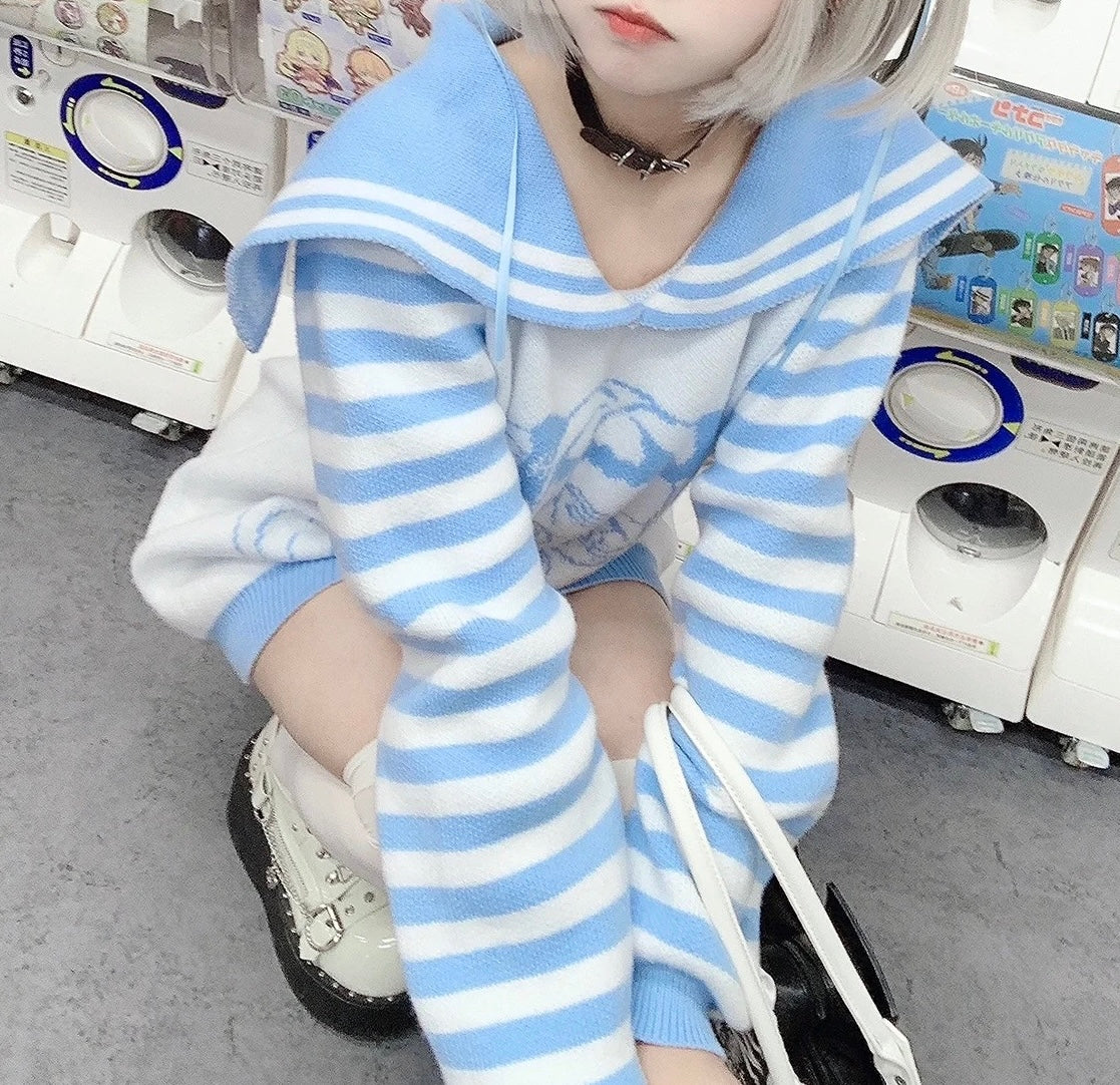 Person wearing a blue and white striped outfit in a laundry room.