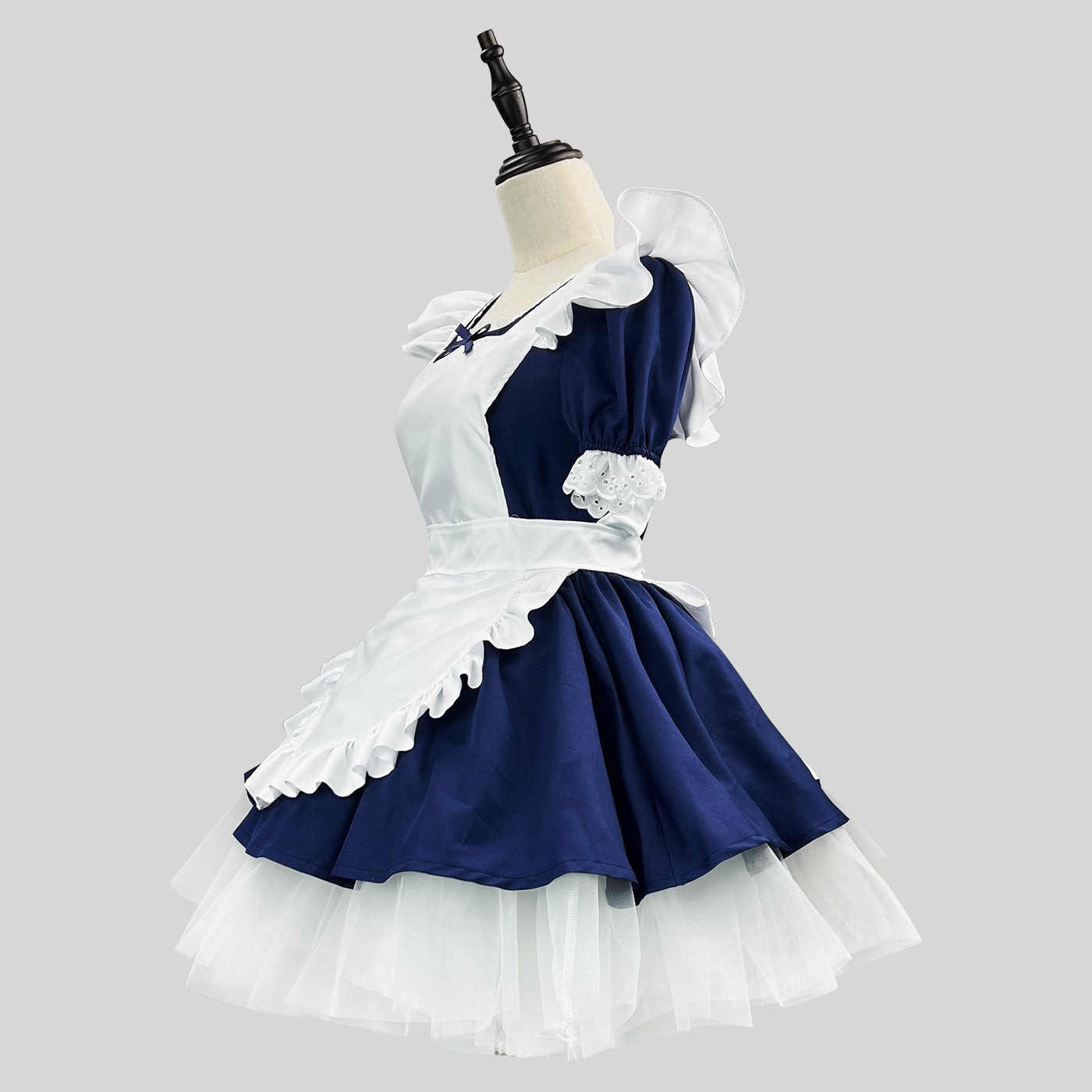 Femboy in a navy cosplay lolita maid dress