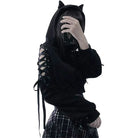 Femboy in black cat crop hoodie with ears with black plaid skirt