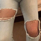 femboy in black crotchless fishnet pantyhose with rhinestones with jean