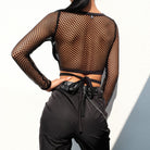 Femboy in Black Fishnet Crop Top Long Sleeve Back - Femboy Fashion