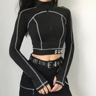 Femboy in black long sleeve turtleneck crop top front 