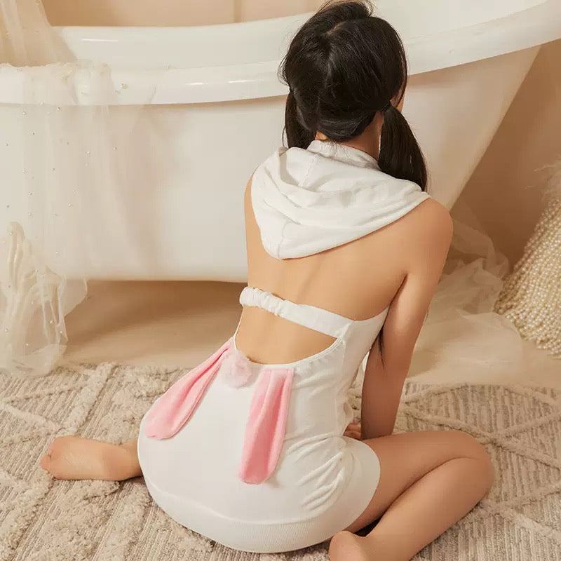 Person wearing a white cute sleeveless bunny lingerie
