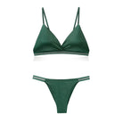 Femboy in green satin bra and bikini panty set