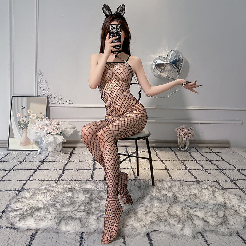 Femboy in sexy crotchless fishnet bodystocking