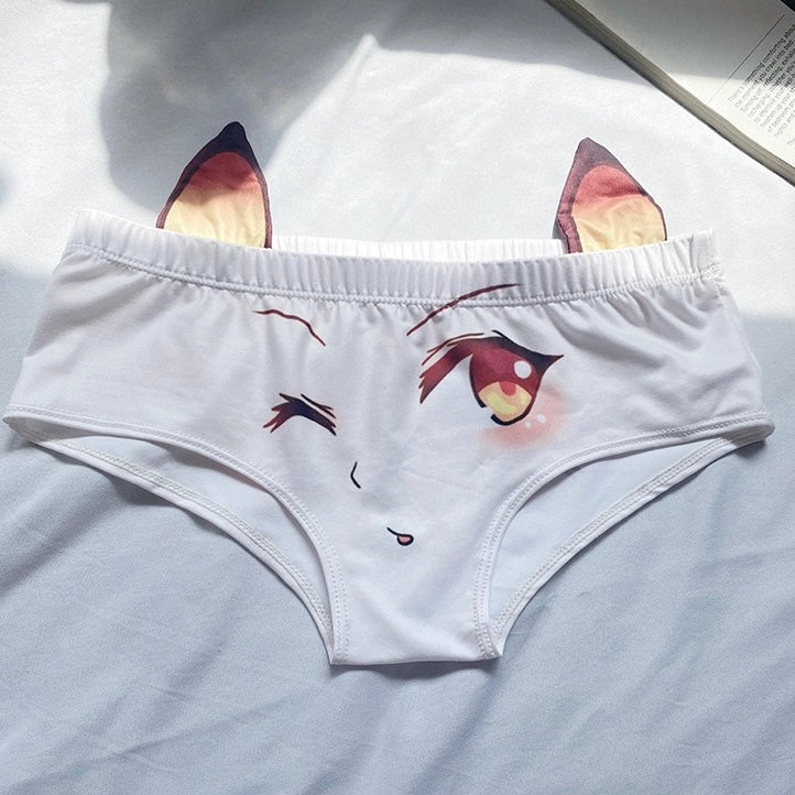 White underwear with fox ears and face design on a light blue surface