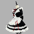 Person wearing a detailed maid outfit with red and black accents, holding a plush toy.