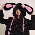 Femboy wear a black cute floppy bunny ears hat