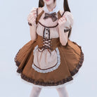 Femboy wearing a brown and beige maid outfit on a light blue background