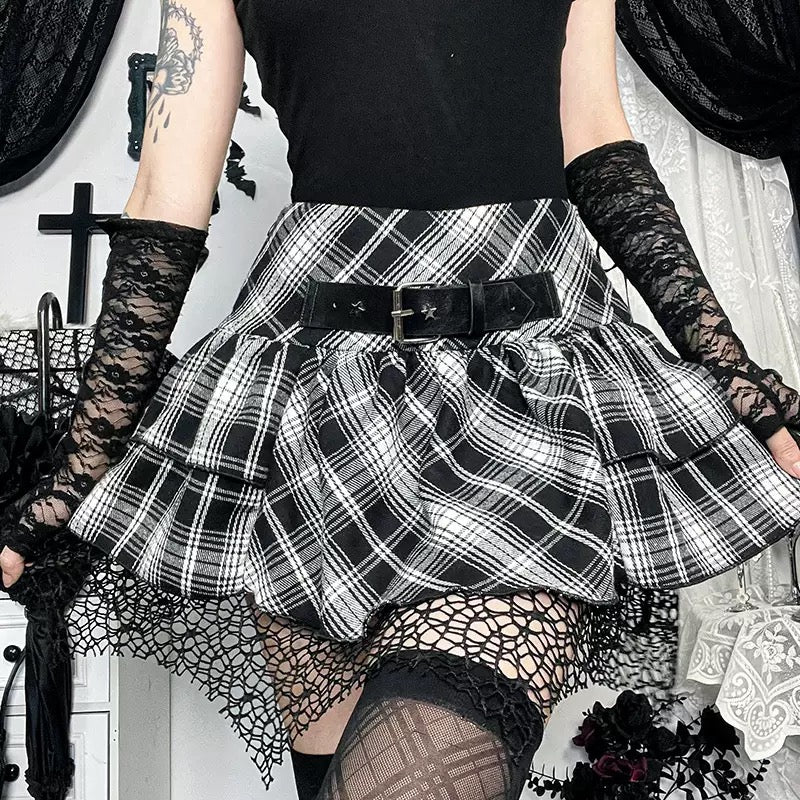 Femboy wear a high waisted black and white plaid skirt and black car ear hoodie back