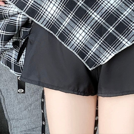 Femboy wear a high waisted black and white plaid skirt and black car ear hoodie
