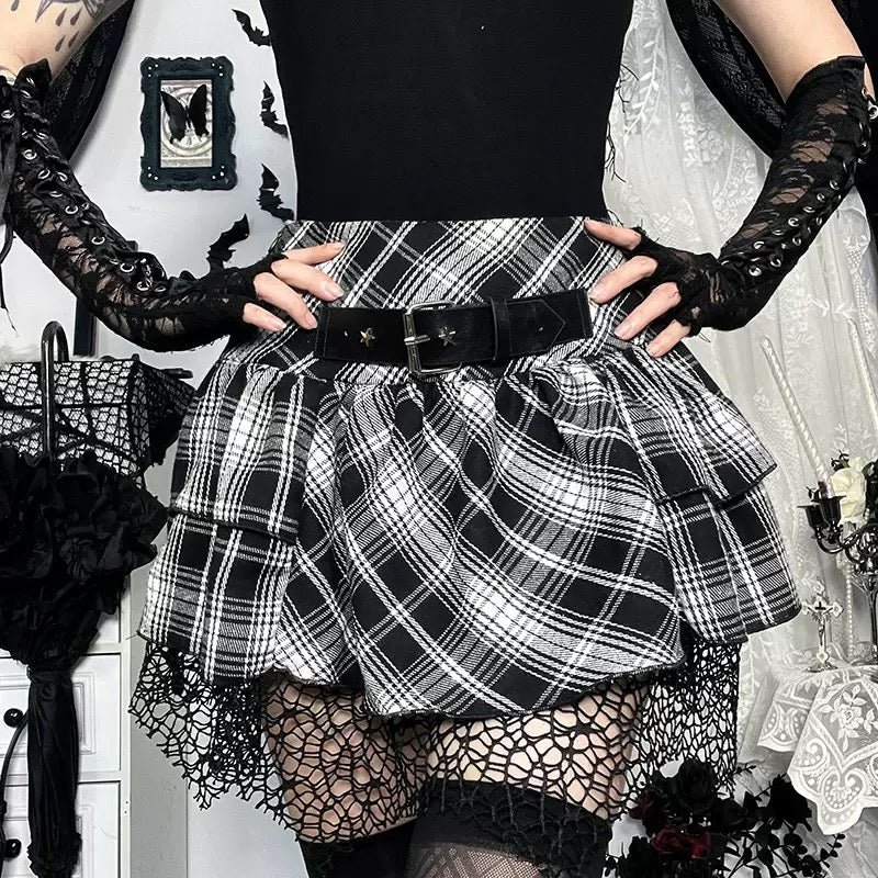 Femboy wear a high waisted black and white plaid skirt and black top
