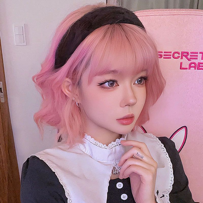 Femboy wear a pink bob wig