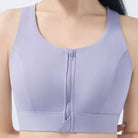 Femboy wear a purple front zip sports bra