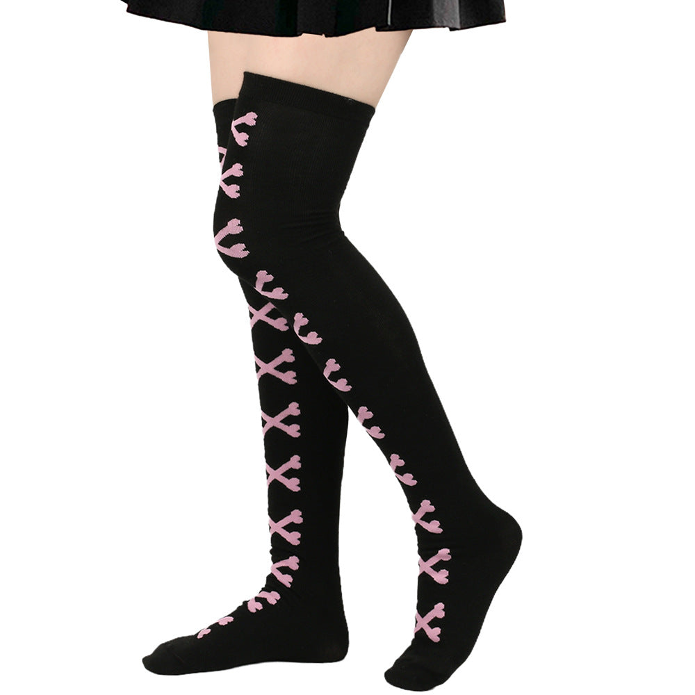 Femboy wear black and pink skeleton bone thigh high socks