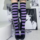 femboy wear black and purple thigh high socks