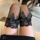 Femboy wear black lace high thigh stockings with big bow