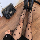 Femboy wear black polka dot sheer pantyhose front