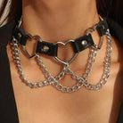 Necklace with black leather and silver chain design on a person wearing a black top.