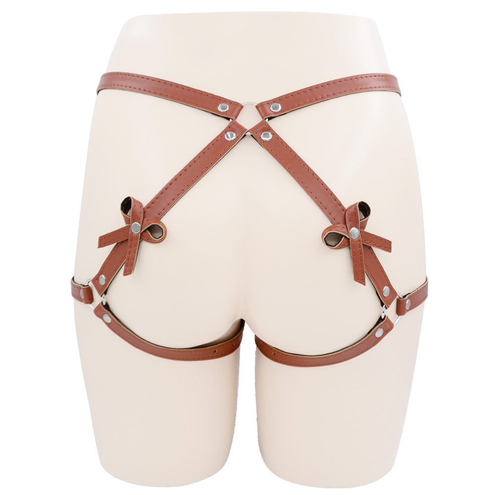 Femboy wear brown leather booty harness with bow