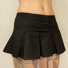 Femboy wear low waisted black mini skirt