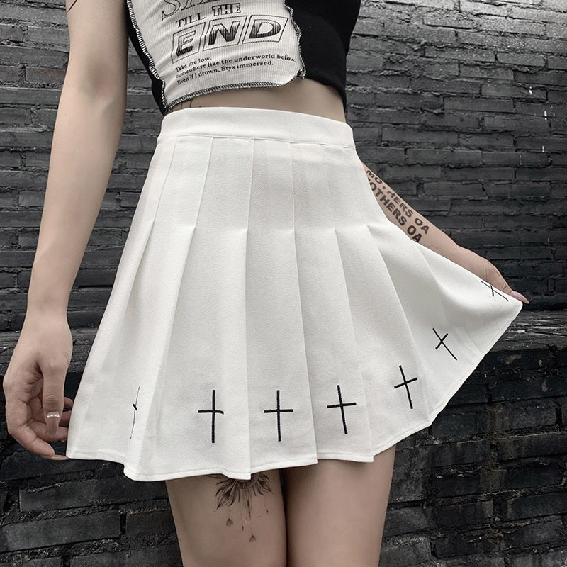 Femboy In White Pleated Skirt With Cross - Femboy Fashion