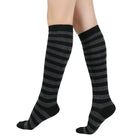 Black and gray femboy pin striped knee-high socks on a white background