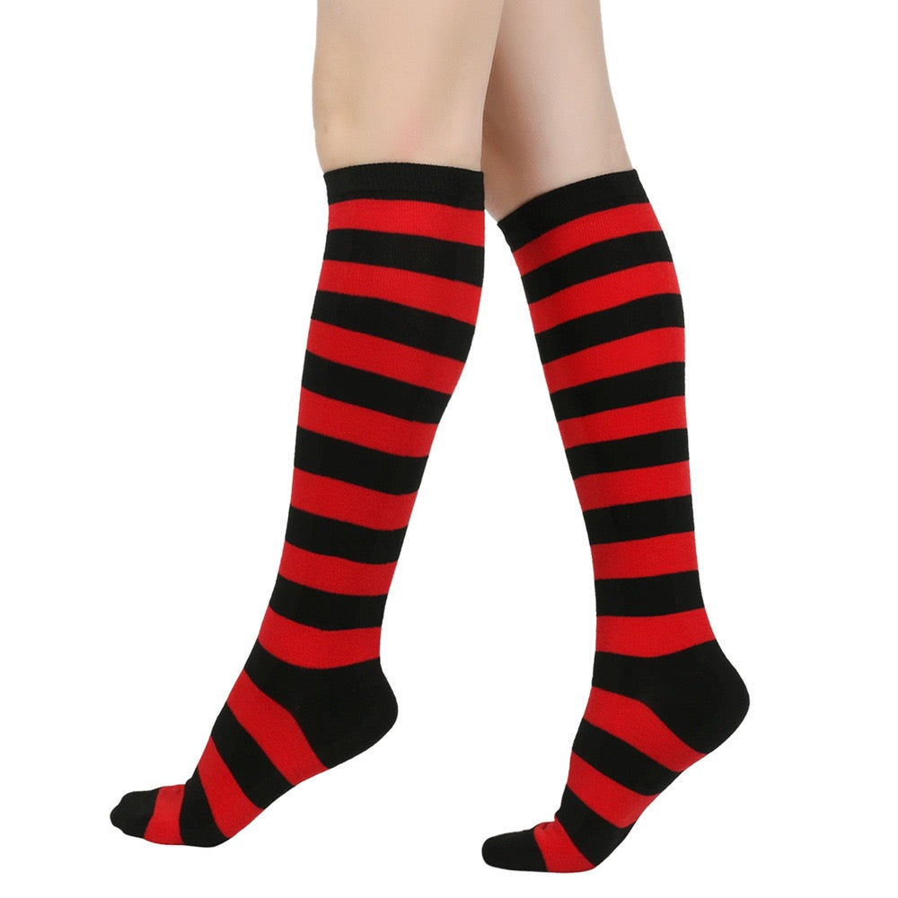 Black and red femboy striped knee-high socks on a white background