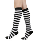 Black and white femboy pin striped knee-high socks on a white background
