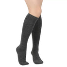 Dark grey knee-high socks on a white background