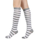 Gray and white femboy pin striped knee-high socks on a white background